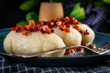 Kartacze - potato dumplings stuffed with minced meat.