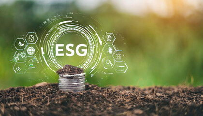 ESG icon concept in the hand for environmental, social, and governance in sustainable and ethical business on the Network connection on a green
