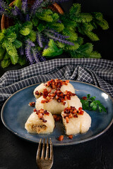 Kartacze - potato dumplings stuffed with minced meat.