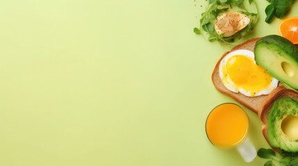 Energizing breakfast setup with avocado toast, sunny side up egg, and fresh juice on a vibrant green background - Powered by Adobe