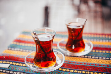 Turkish tea is served in a street cafe in Istanbul, Turkey. - 741850659