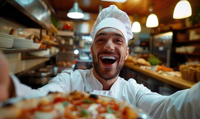 Gordijnen A laughing loudly kitchen chef holding a selfie camera, modern pizzeria background © piai