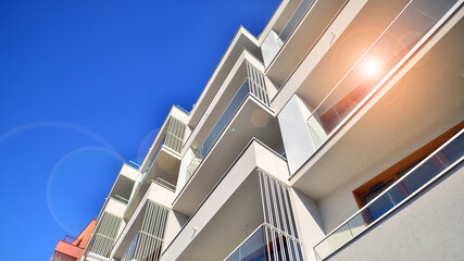 Obraz premium Modern architecture of urban residential apartment building. Apartment building exterior, residential house facade.