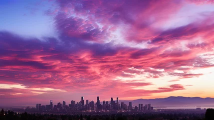 Photo sur Plexiglas Tailler The sky above the city is painted in pastel shades of orange, pink and purple, when the sun sit