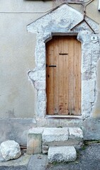 beautiful castle door. carved stone secondary entrance in a medieval castel, France 