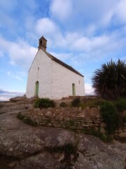 Roscoff landmark. Saint Barbe Chapel. St. Barbe chapel on the port of Roscoff, a popular tourist destination in Finistere, Brittany, France, above the harbour and the sea, built in XVIII century, 