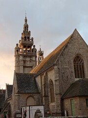 Fototapeta na wymiar flamboyant Gothic Breton style cathedral: Notre-Dame-de-Croas-Batz, in Roscoff, Brittany, France Beautifull xvi century church architecture in britany gothic style