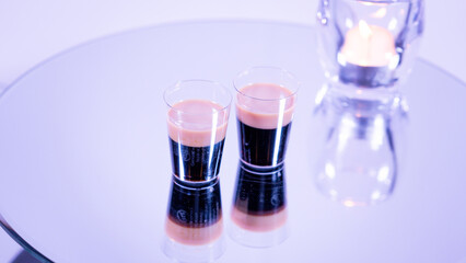 2 shot glasses of baby Guinness.
