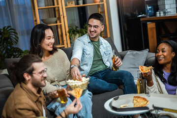 Multiracial group of friends having pizza party.