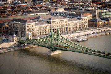 Fototapeta na wymiar Iconic Liberty Bridge, crossing Danube river, connecting Buda and Pest parts of Budapest, Hungary