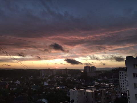 time clouds over city