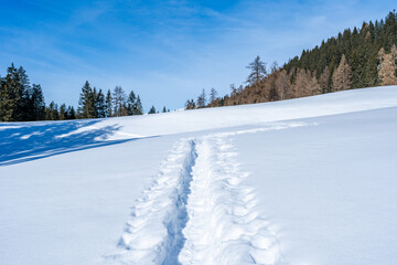 Winter landscape with snow covered Dolomites in Kronplatz, Italy