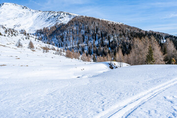 Winter landscape with snow covered Dolomites in Kronplatz, Italy