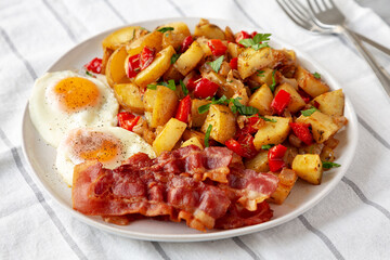 Homemade One-Pan Breakfast Potatoes on a Plate, side view.