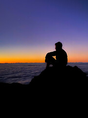 Man Waits for the Sun on Mauna Kea