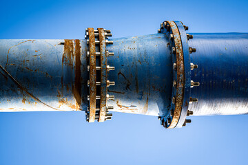 blue pipeline with blue sky in the background