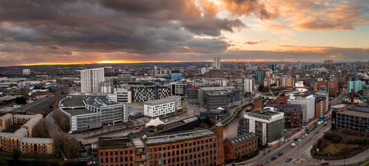 Aerial panorama of Leeds Dock and River Aire in a cityscape skyline at sunrise - obrazy, fototapety, plakaty