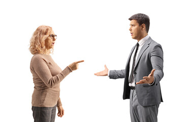 Young businessmen having an argument with a mature woman