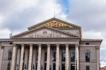 Front view of National theater building with columns in Maxjosephplatz (Munich, Germany).
