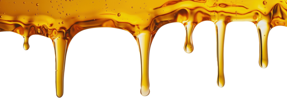 Liquid honey dripping over white transparent background
