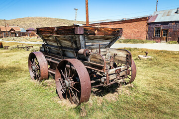 Old mining ore wagon in the mining ghost town of Bodie State Historic Park in the California desert...