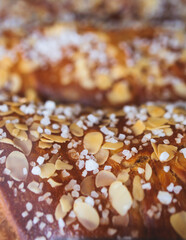 Tsoureki, Traditional Greek Easter Bread, greek freshly baked cake in Athens, Greece, with almond, mastiha, mahleb and cinnamon, orthodox Easter in Greece, sweet bread with red eggs