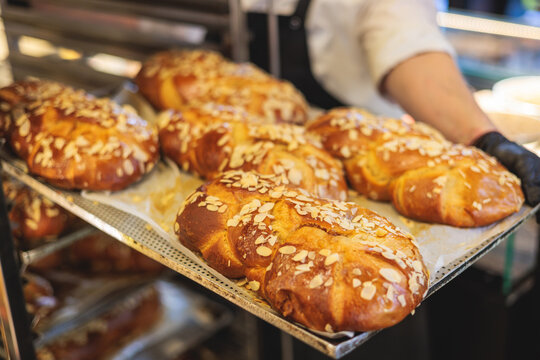 Tsoureki, Traditional Greek Easter Bread, greek freshly baked cake in Athens, Greece, with almond, mastiha, mahleb and cinnamon, orthodox Easter in Greece, sweet bread with red eggs