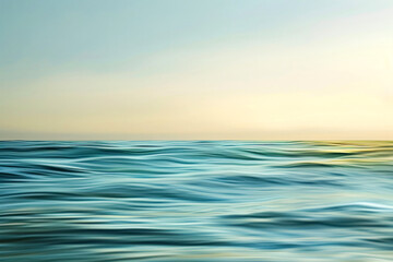 Obraz premium Serene ocean waves captured at sunset under a gradient sky