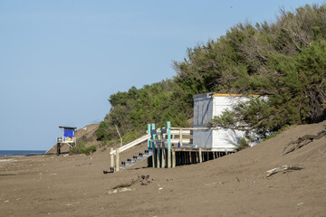 Deserted Beach with Lifeguard Stands Offering a Scene of Peace and Solitude