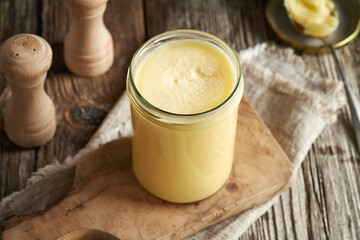 Ghee or clarified butter in a glass jar