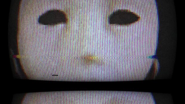 Creepy Mask on tv screen with glitch effect