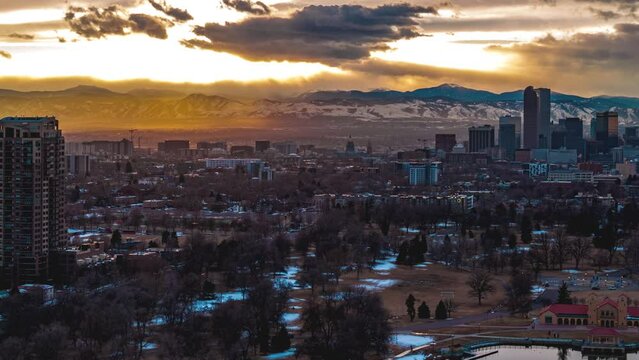 Beautiful sunrays over cityscape, urban, drone hyperlapse, Denver, Colorado, 4K