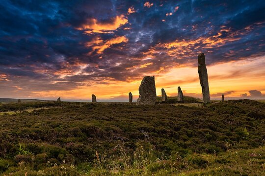 Neolithic stone circle, henge, Ring of Brodgar, dramatic sunset, Mainland, Orkney Islands, Scotland, United Kingdom, Europe