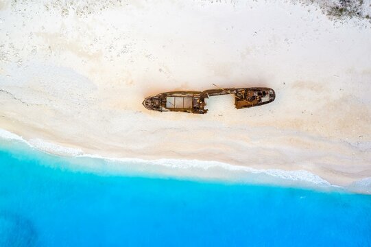 Beach shipwreck Navagio Beach drone shot bird's eye view in Zakynthos, Greece, Europe