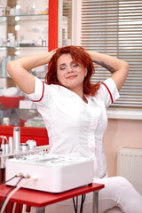 Bright girl cosmetologist doing stretching exercise