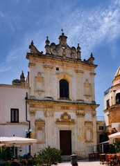 Fototapeta premium Piazza Salandra, located in Nardò (Puglia, Italy),is a true gem of Baroque architecture. This space represents the beating heart of the city,surrounded by historic buildings and charming atmosphere