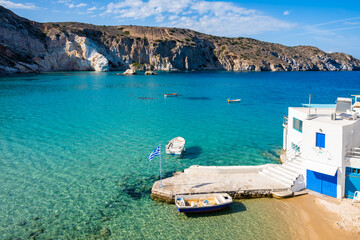 View of beautiful sea bay in Firopotamos village with white houses on shore, Milos island, Cyclades, Greece - 742027411