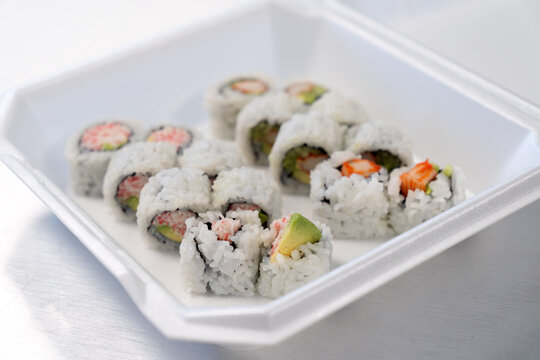 California sushi roll to go in container