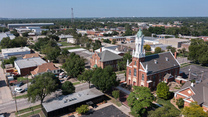 Afternoon view of a historic church and buildings in Old Town Wichita Kansas, USA.