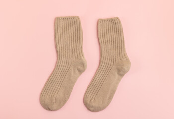 Warm wool socks on a light background