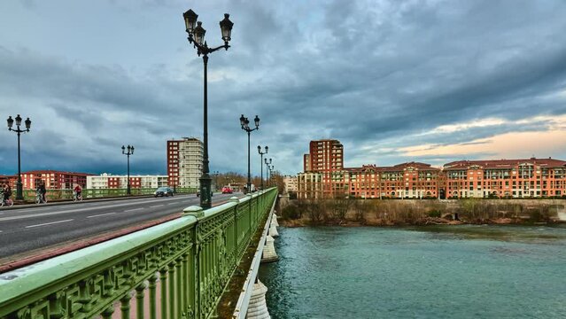 Timelapse Bridge of Catalans (Amidonniers Bridge) is Toulouse, France bridge crossing Garonne river. It is bridge in arch and stone and reinforced concrete inaugurated in 1908. Architect Paul Sejourne