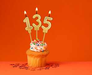Number 135 candle - Birthday card design in orange background