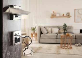 Mortgage. Door with key open into room