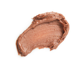 Smear of tasty nut butter isolated on white, top view