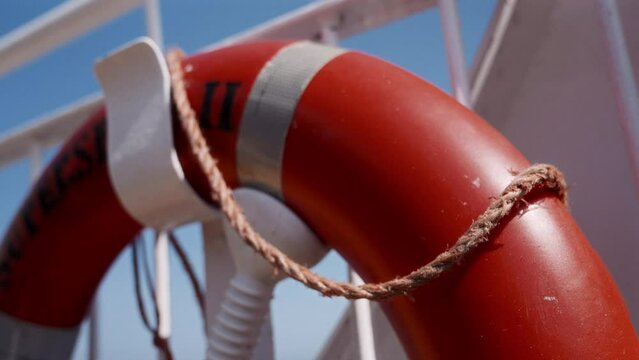 Close-Up Of Life Buoy With Nautical Rope
