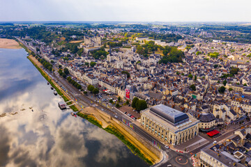 Aerial view of the city of Saumur and medieval castle Saumur on the banks of the Loire river. France