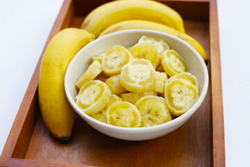 Banana slices on white background.