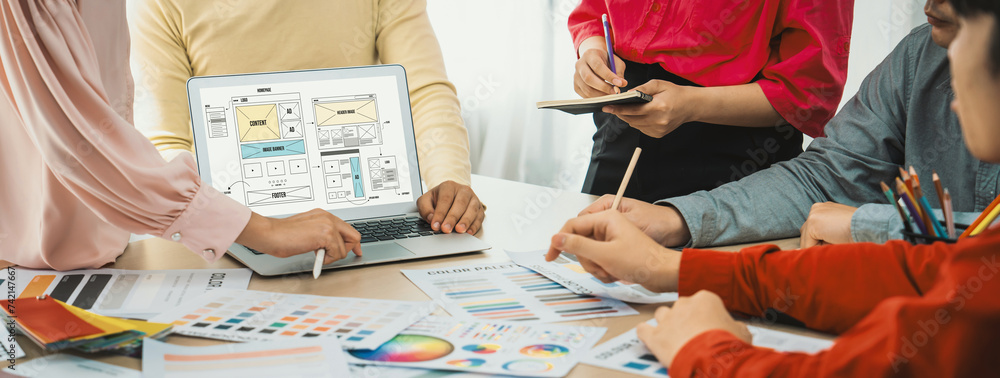 Aufkleber cropped image of interior designer team discuss the material color while laptop displayed website wi