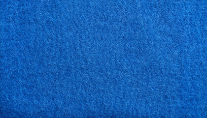 blue felt fabric texture as background. melange fuzzy woolen cloth textured; close up of textile surface