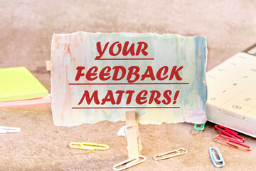 Your Feedback Matters written on a piece of paper in a clothespin